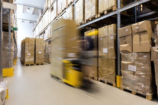 Fork lift operator preparing products for shipment.jpeg