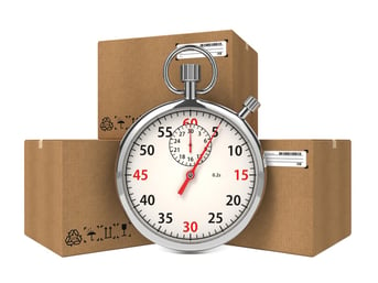 Stopwatch Over a Carton Boxes. Express Delivery Concept..jpeg